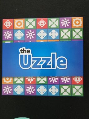 The Uzzle Card Game – Blue Box with Multicolor Icons